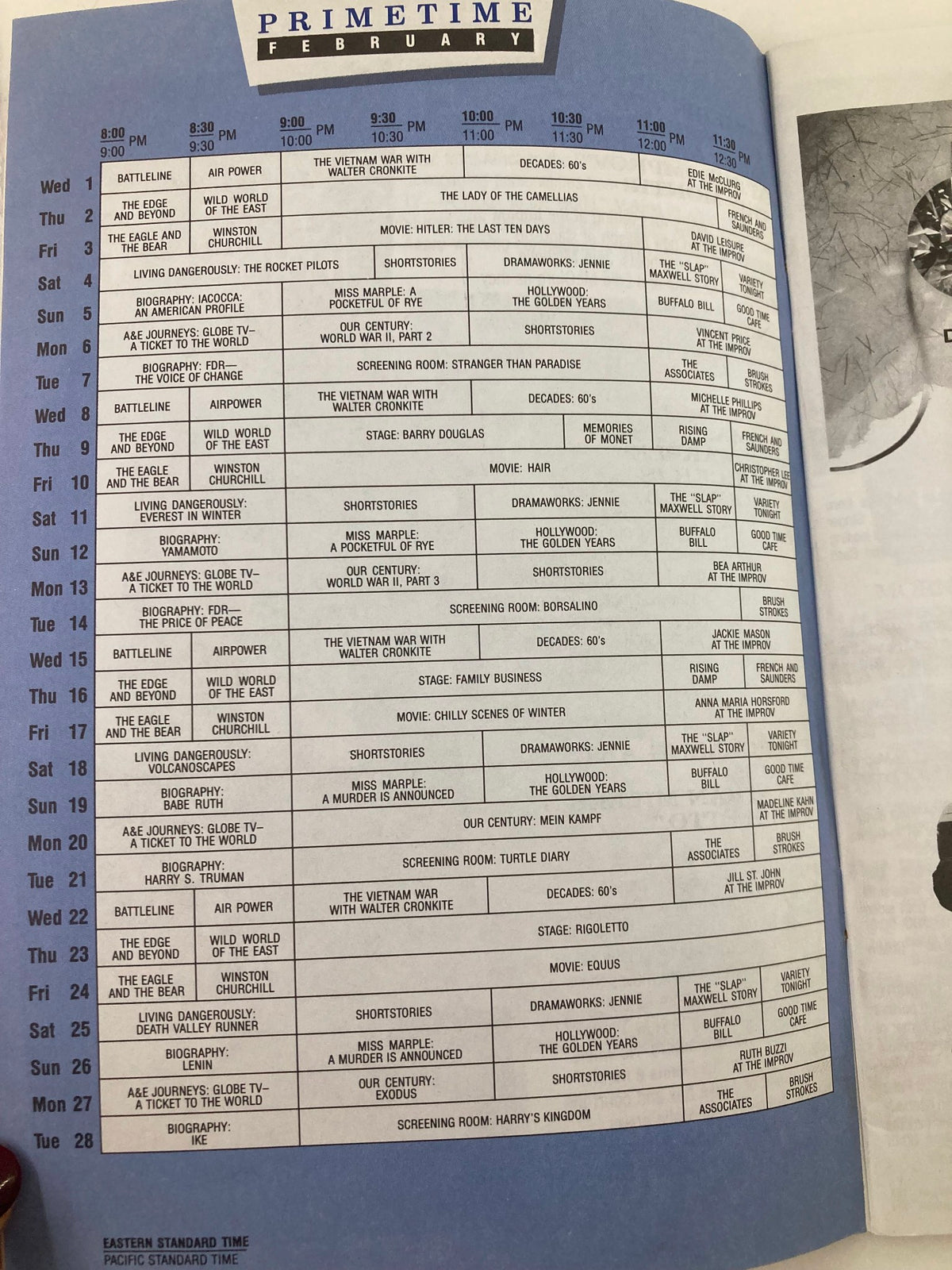Inside view of the VTG A&E Cable Network Program Guide from February 1989, highlighting primetime television programming schedule, activities, and shows featuring Dwight Eisenhower.