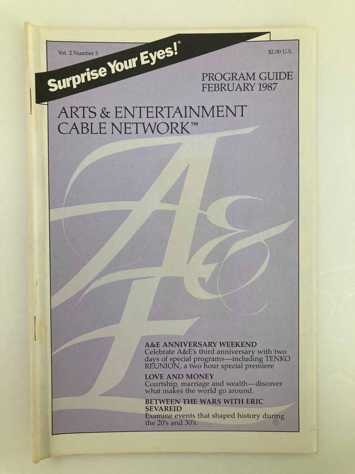 Cover of the VTG A&E Cable Network Program Guide February 1987, Volume 2, Issue 5, featuring a headline that reads 'Surprise Your Eyes!' and highlights the 'Tenko Reunion' program.