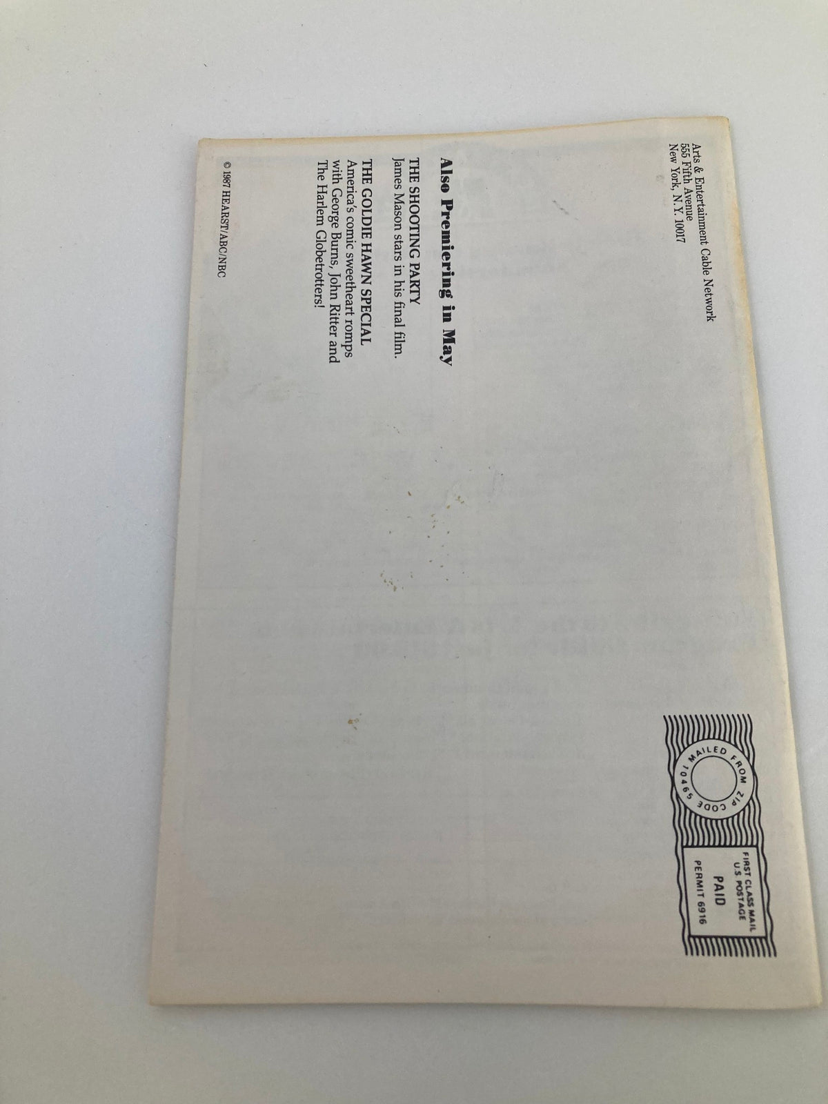 Reverse side of the May 1987 A&E Cable Network Program Guide Volume 2 #8 titled Love and Money, showcasing details about upcoming shows and mailing information.