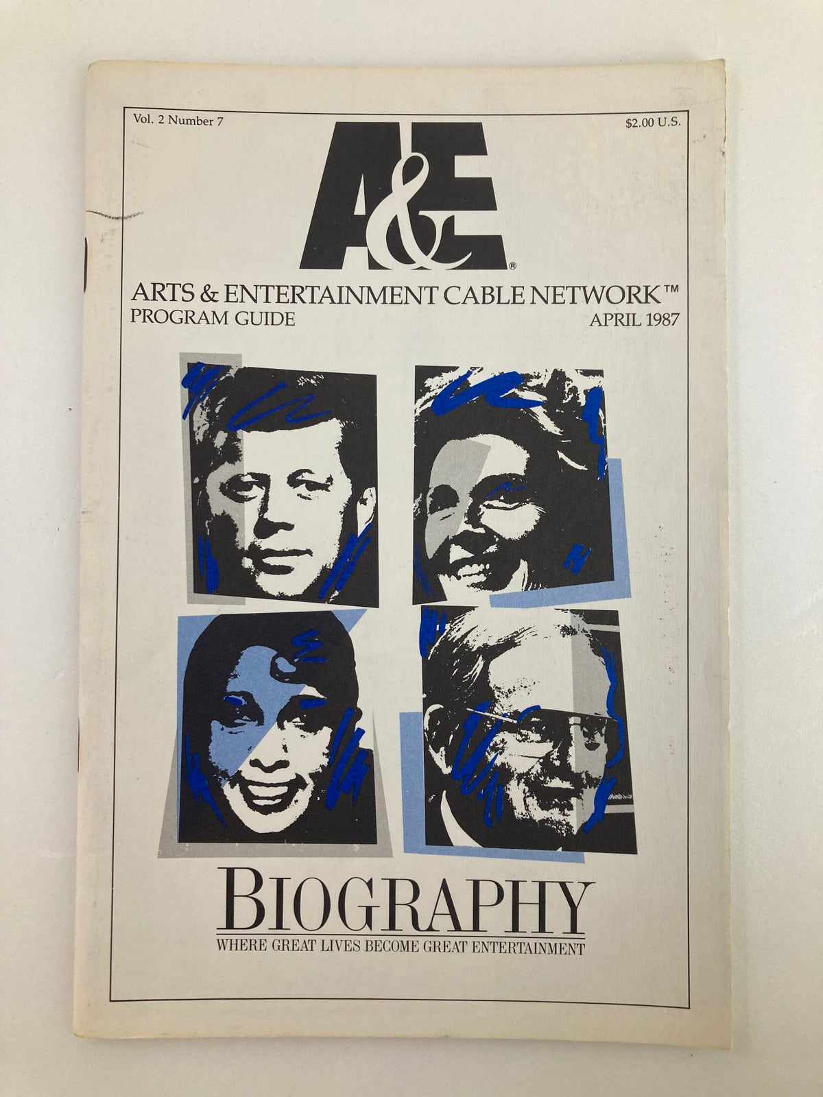 VTG A&E Cable Network Program Guide April 1987 Vol 2 #7 featuring images of John F. Kennedy and other notable figures, showcasing vintage television history.
