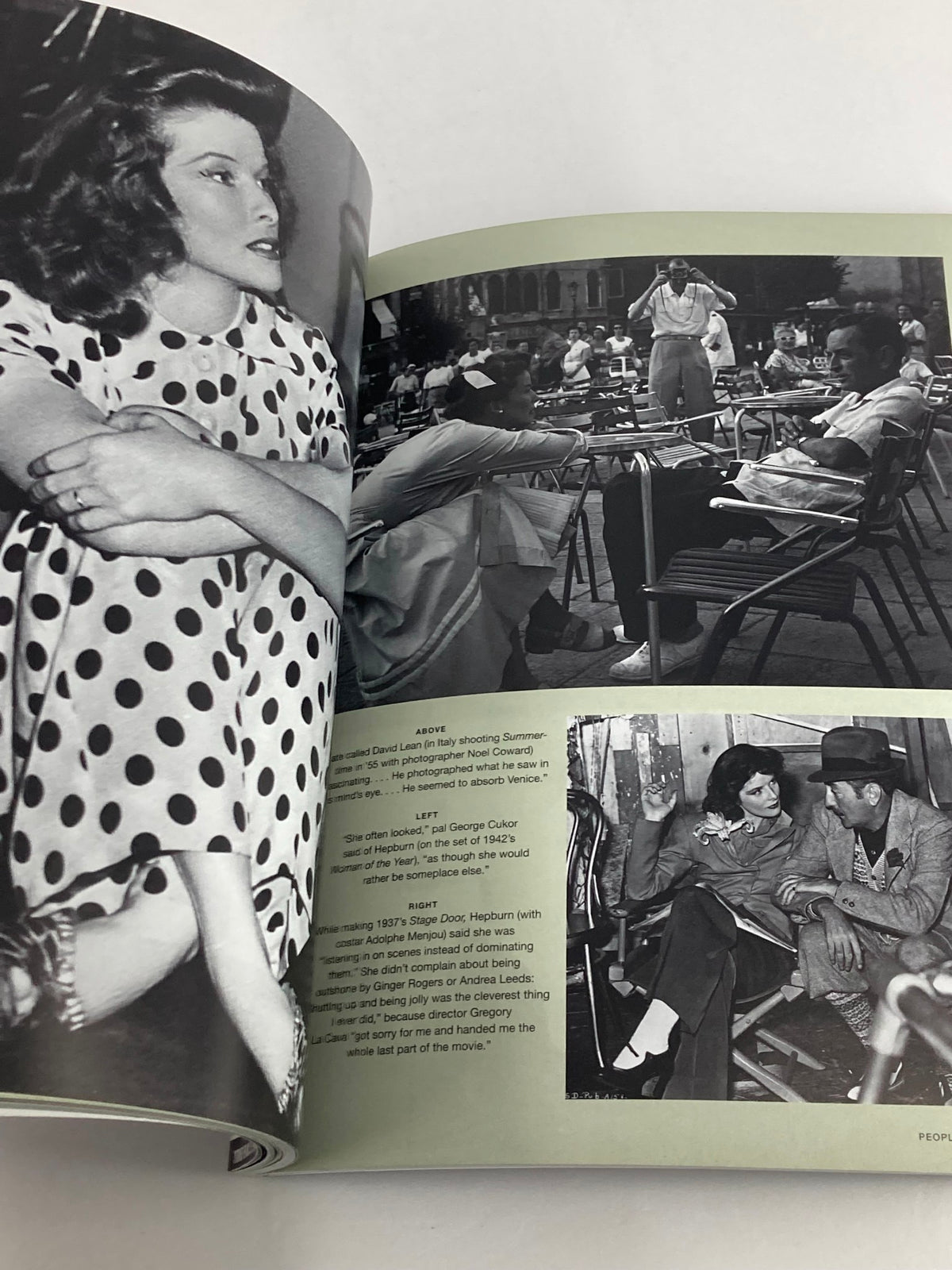 Historic scene in People Magazine Tribute Commemorative Issue Katharine Hepburn 1907-2003 showing a woman sitting elegantly in a cafe, capturing a moment of 1940s cinematic charm.