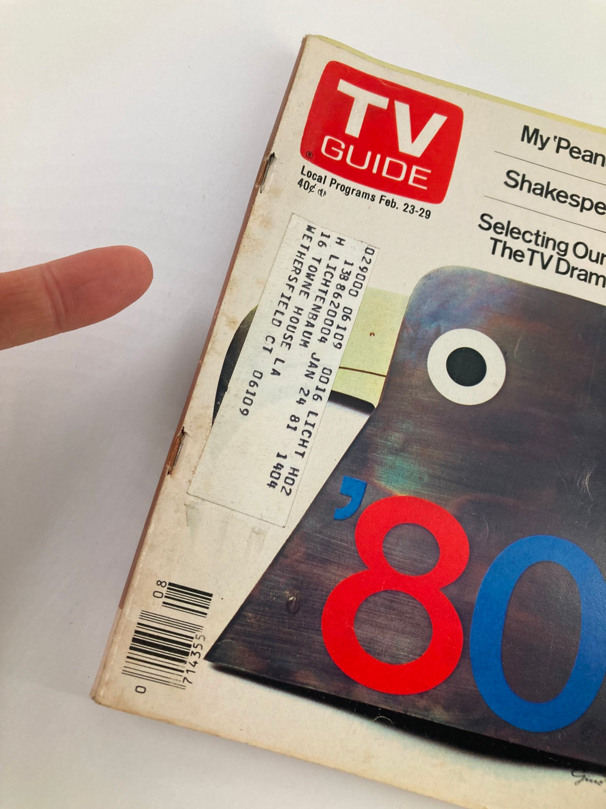 Close-up of the spine area of TV Guide Magazine February 23, 1980, showing the subscription address label and distinctive cover design.