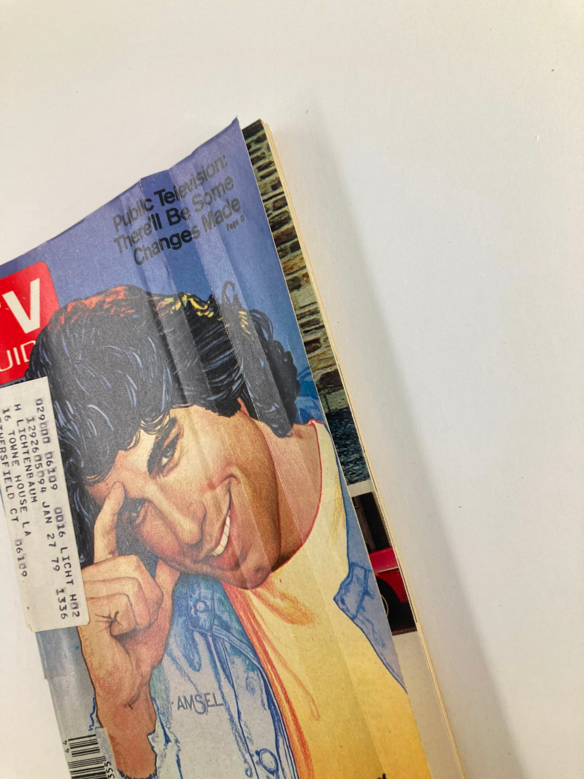 Side view of the TV Guide Magazine, November 4, 1978 with John Travolta on the cover, displaying minor wear typical for its age, including an address label.