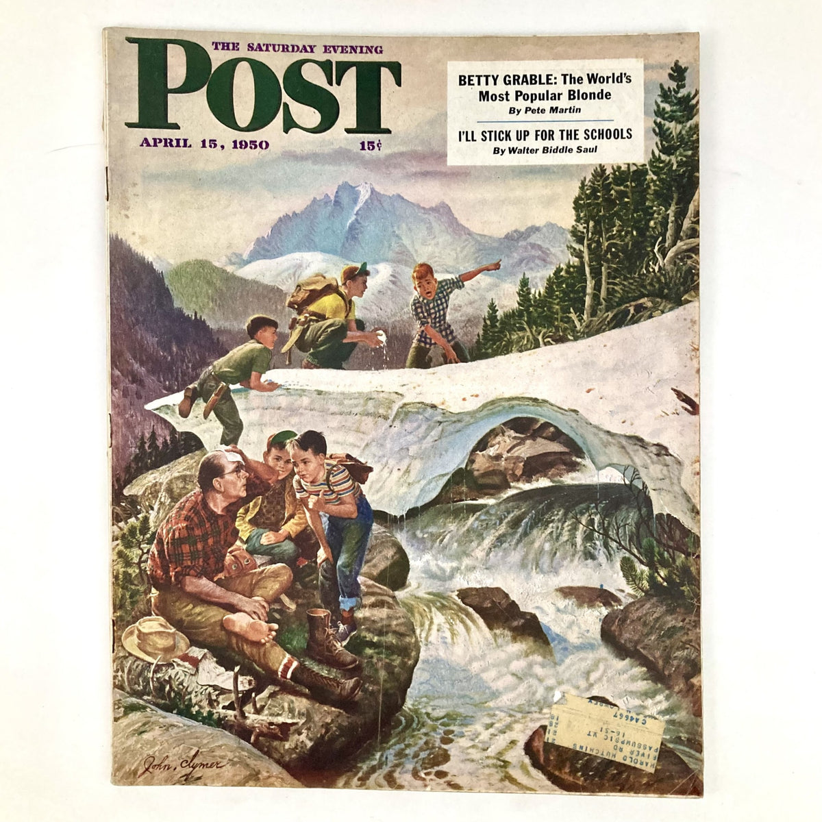 Cover of the Saturday Evening Post Magazine dated April 15, 1950, illustrated by John Clymer, showcasing a family enjoying a day in nature with children playing and a mountain backdrop.