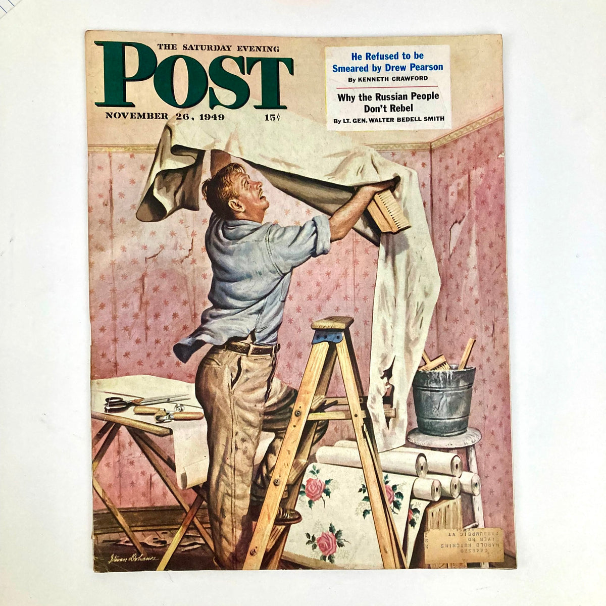 Cover of Saturday Evening Post Magazine from November 26, 1949, featuring a man hanging wallpaper, illustrating American life in the late 1940s by artist Steven Dohanos.