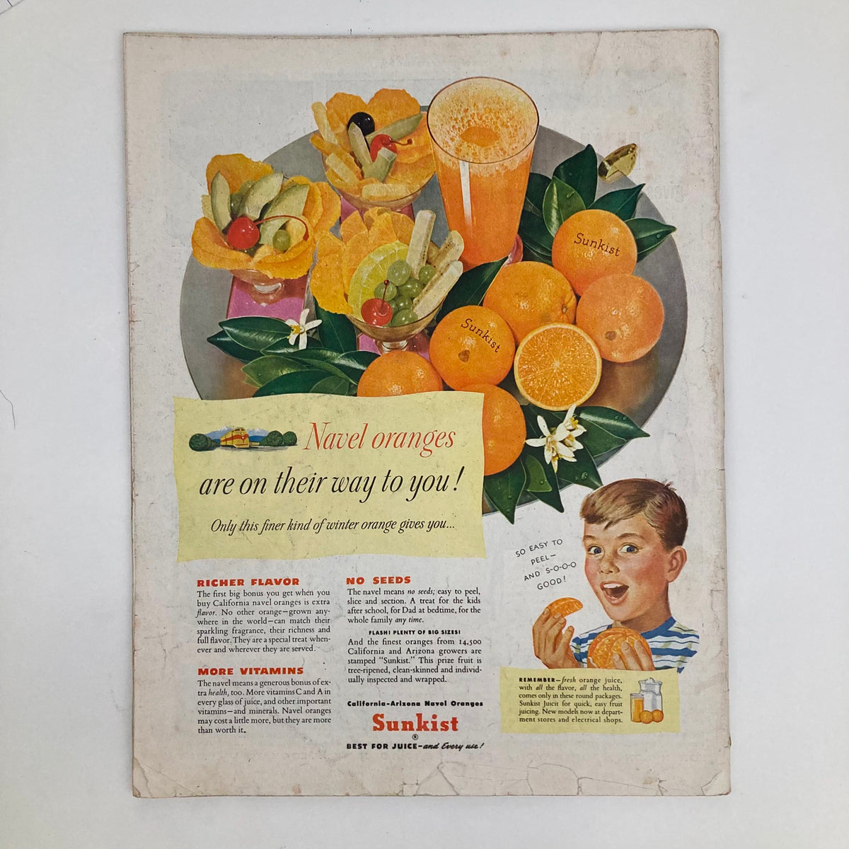 Vintage advertisement from Saturday Evening Post Magazine November 26, 1949 presenting Sunkist Navel Oranges. The ad highlights the fruit's qualities with vibrant colors and a joyful child enjoying an orange.