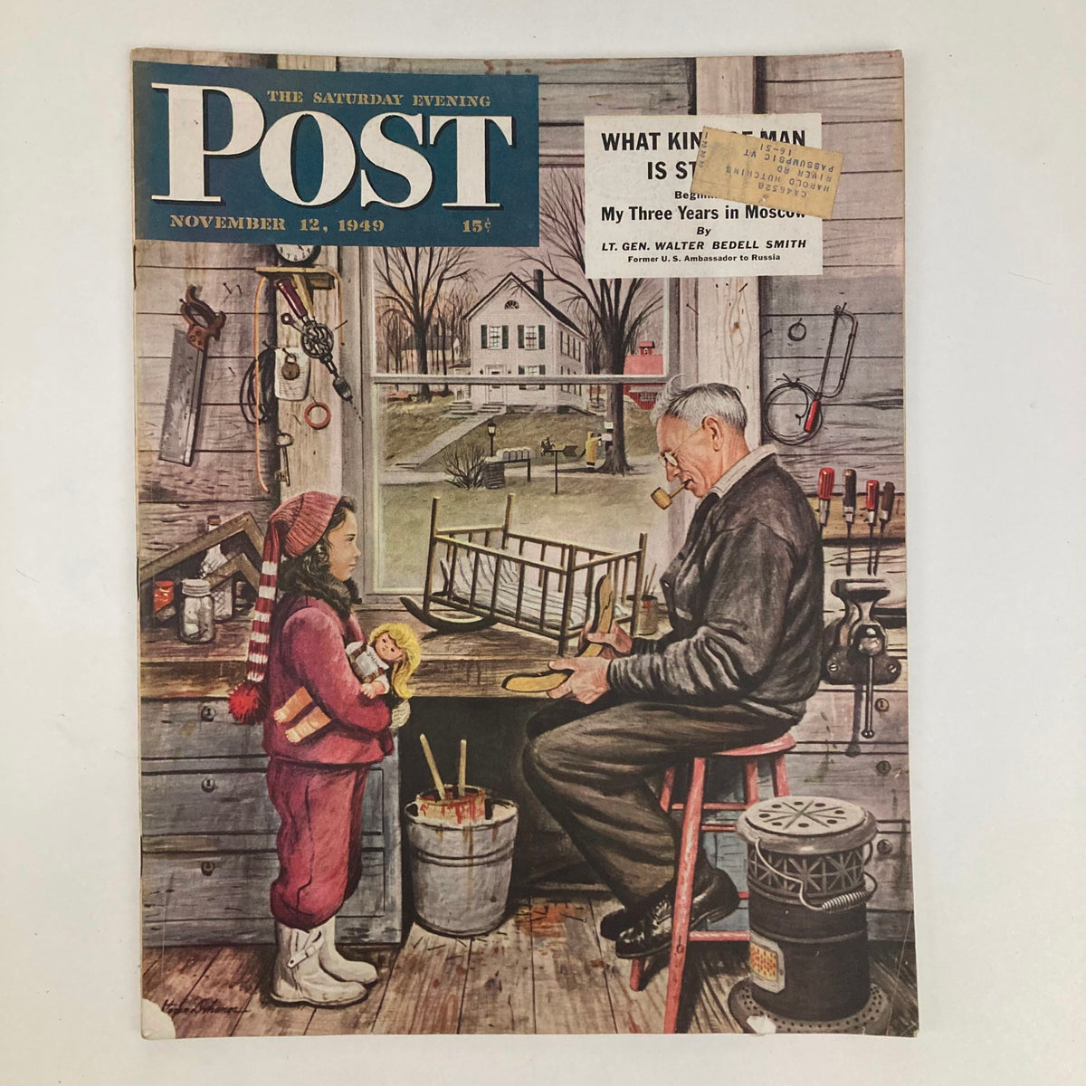 Cover of Saturday Evening Post Magazine from November 12, 1949, featuring a whimsical illustration by Stevan Dohanos, depicting a girl with a doll interacting with an elderly man in a workshop setting.
