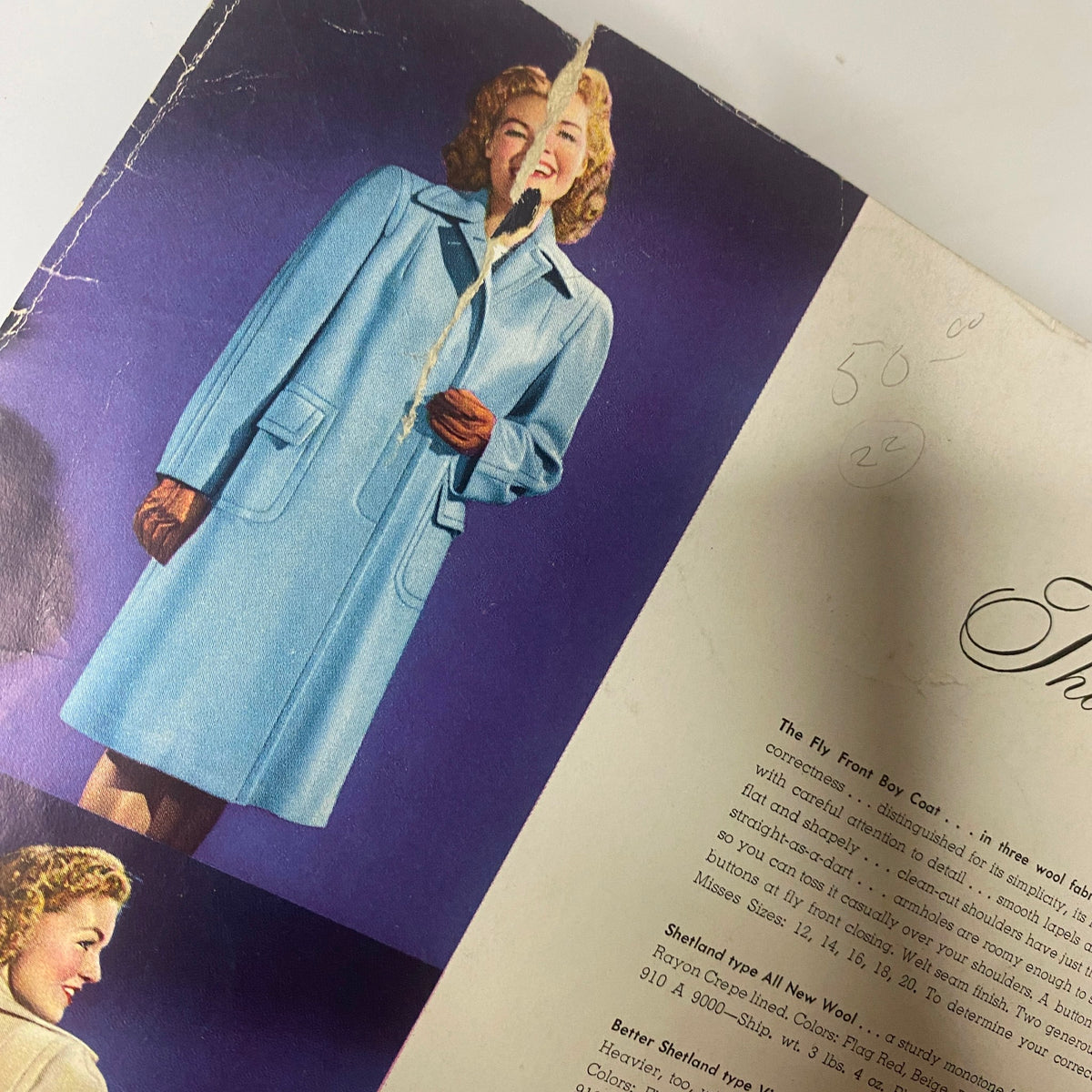 Interior page of the 1943 Montgomery Ward Spring and Summer Catalog showcasing a woman in a light blue coat with the catalog description on its side.