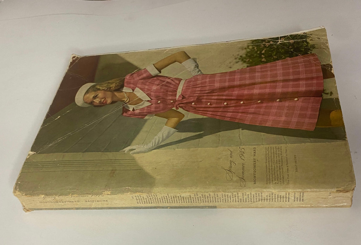 Side view of the 1945 Montgomery Ward Spring and Summer Catalog, highlighting the vintage charm of the magazine featuring pastel fashion designs.