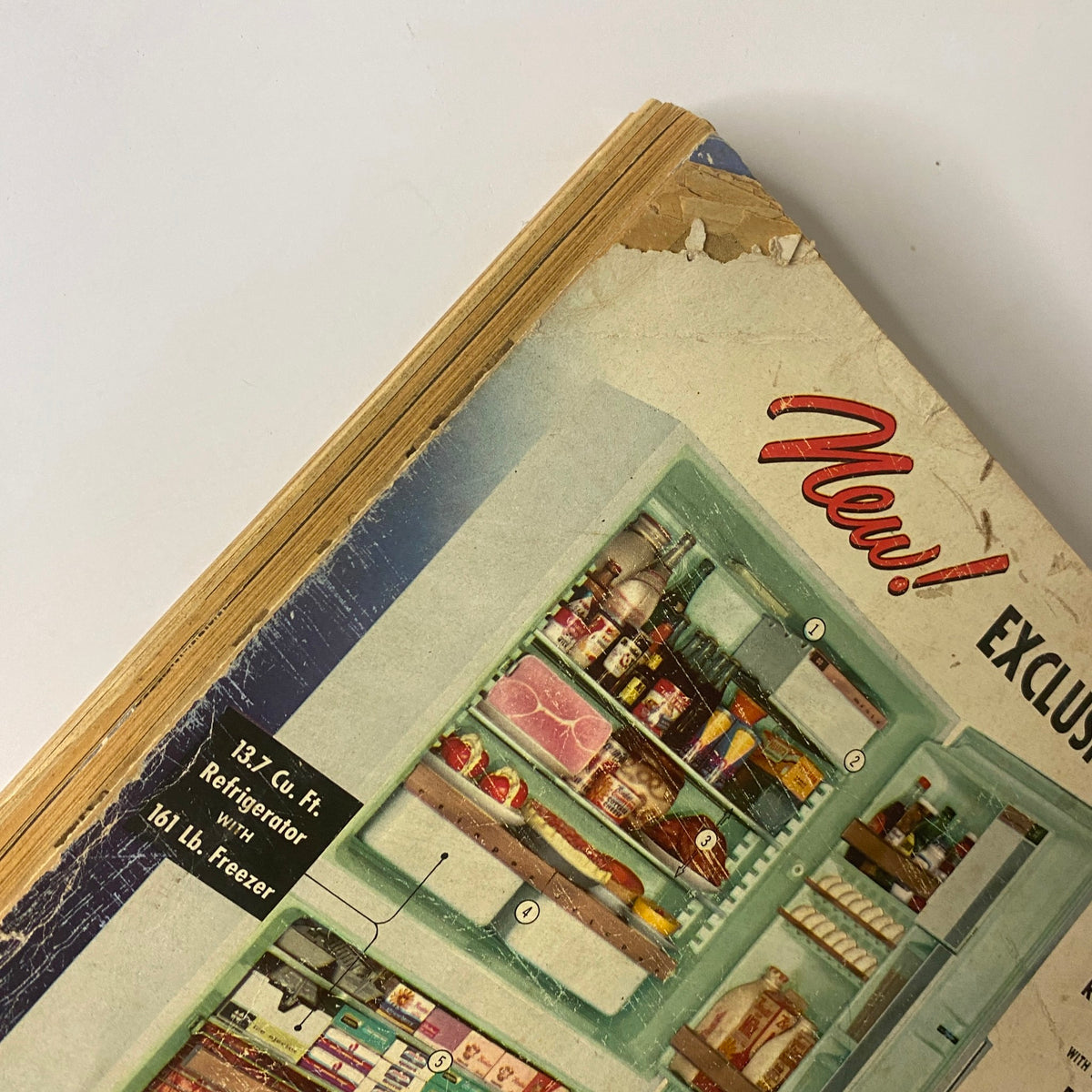 Detailed view of the Cycle-Cold refrigerator advertisement in the 1958 Montgomery Ward Spring and Summer Catalog highlighting its features and specifications.
