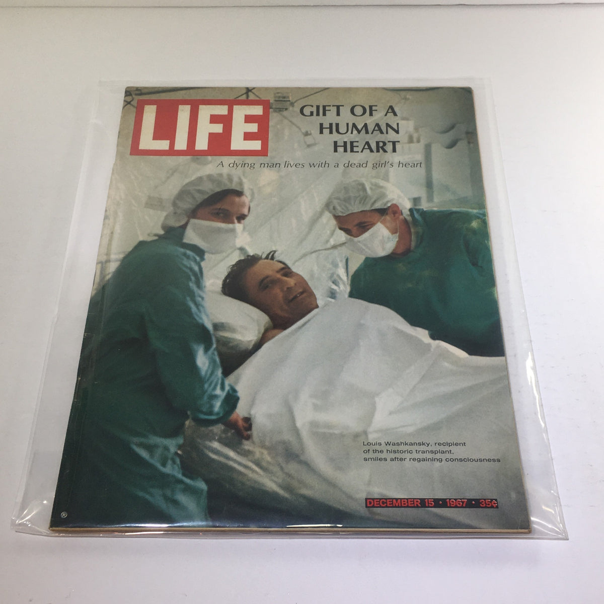 Cover of Life Magazine dated December 15, 1967, featuring the title 'Gift of a Human Heart', depicting Louis Washkansky, recipient of a heart transplant, surrounded by doctors in surgical attire.