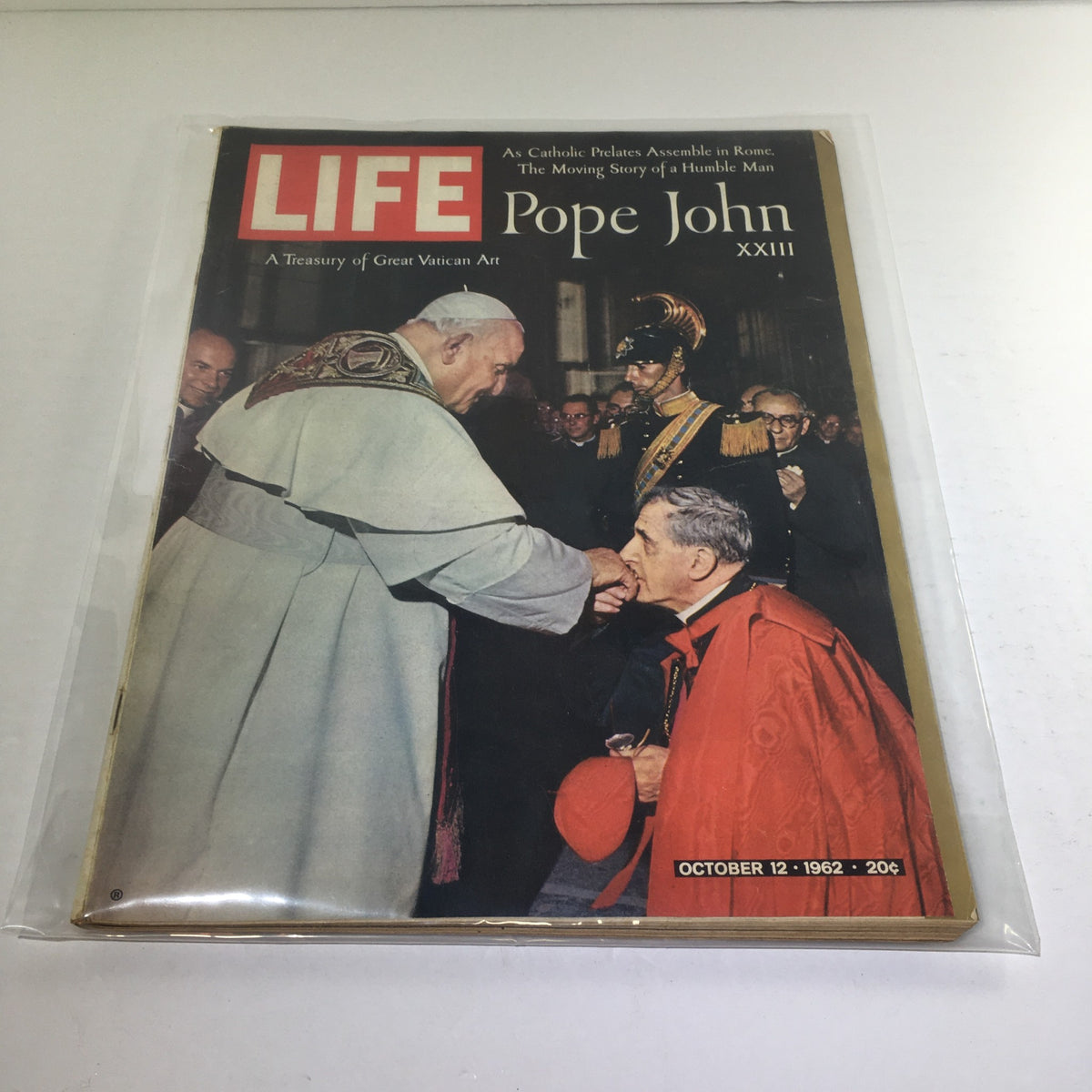 Life Magazine from October 12, 1962 featuring Pope John XXIII on the cover, depicting the Pope in a ceremonial setting, emphasizing the magazine's historical significance and cultural context.