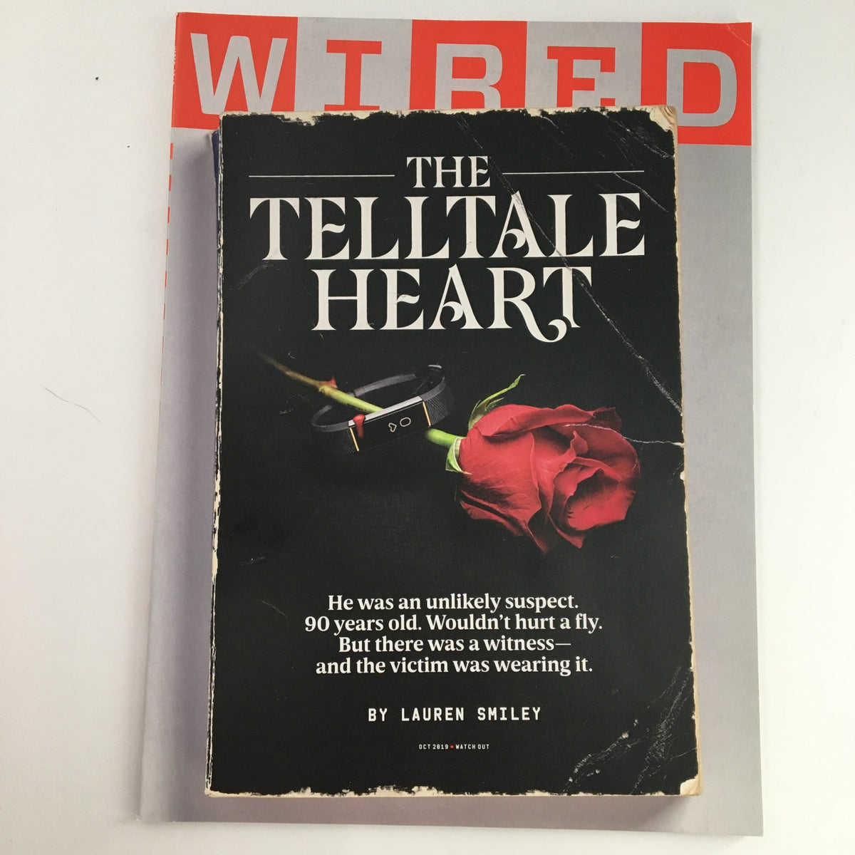Wired Magazine October 2019 cover featuring 'The Telltale Heart' by Lauren Smiley. The cover showcases a rose with a black background and a compelling tagline about a 90-year-old suspect, illustrative of contemporary storytelling and cultural insights.