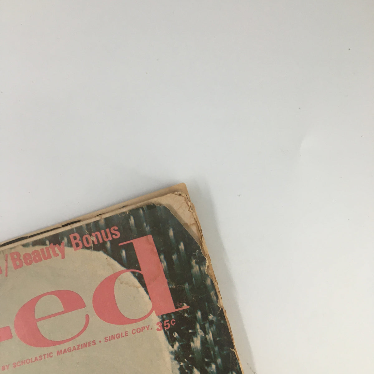 Close-up view of the cover of VTG Co-Ed Magazine February 1967 titled 'I Loved Paris Every Moment', highlighting the magazine's title and vintage aesthetic.