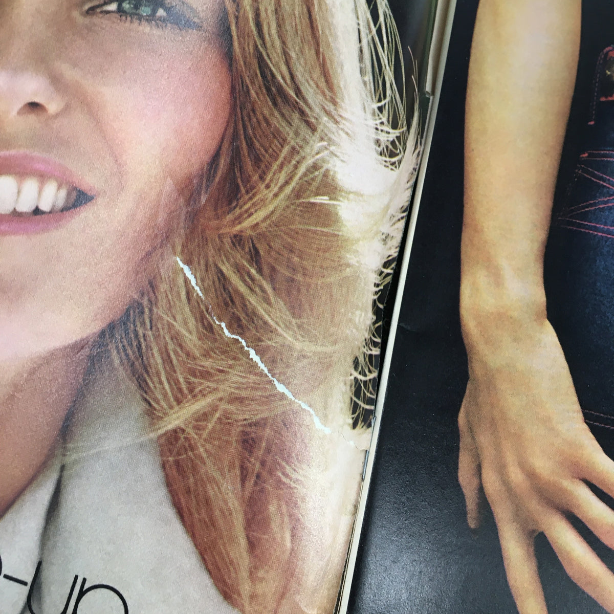 Detail of VTG Co-Ed Magazine May 1973 showing a smiling woman with stylish hair, showcasing retro beauty trends from the 70s.