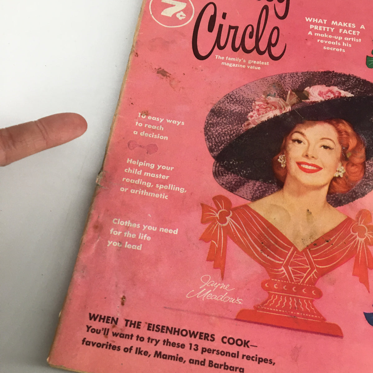 Close-up of the VTG Family Circle Magazine September 1957 cover highlighting Judy Holliday with a decorative hat, showcasing vintage magazine artwork.