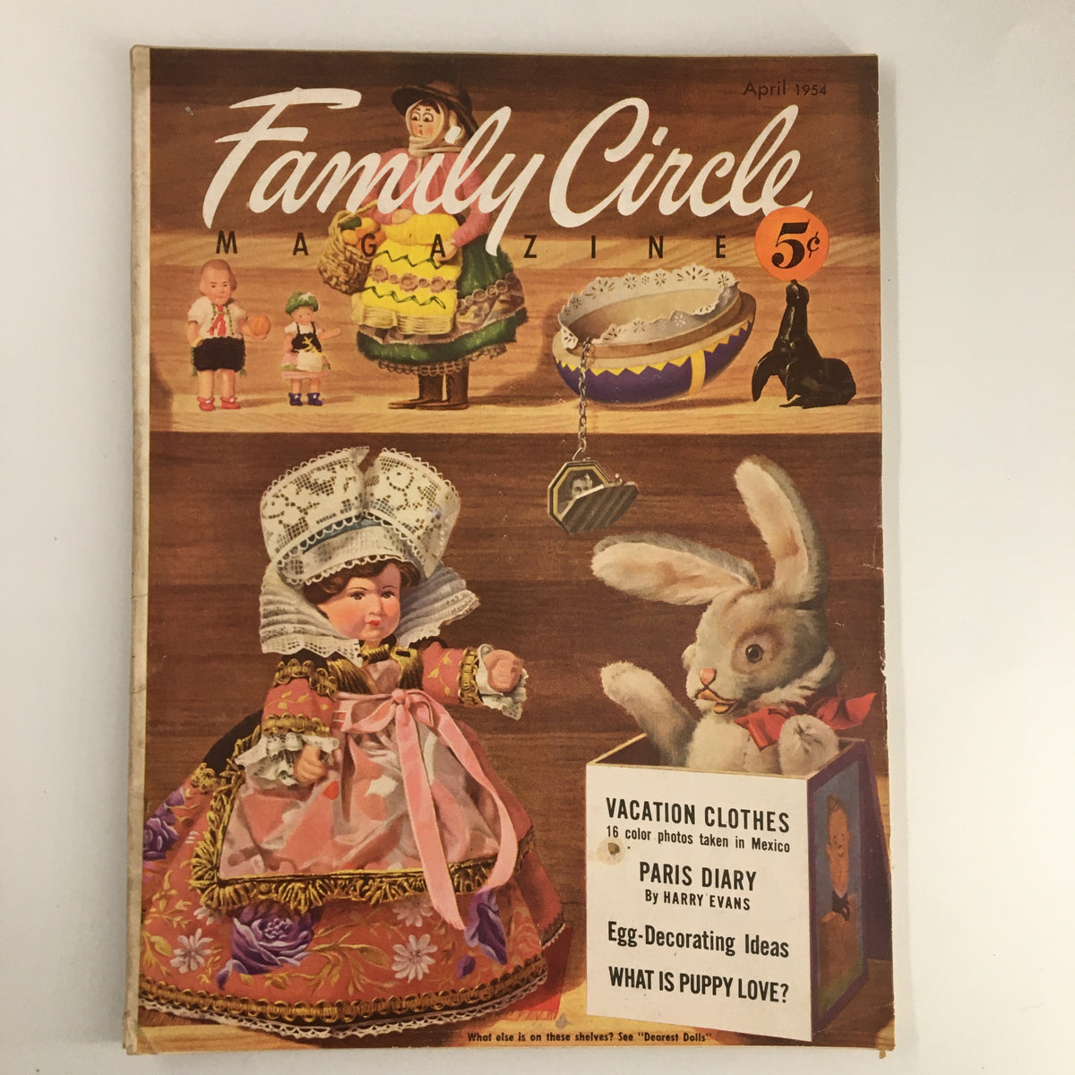 VTG Family Circle Magazine April 1954 cover featuring egg-decorating ideas and classic 1950s illustrations with dolls and Easter themes.