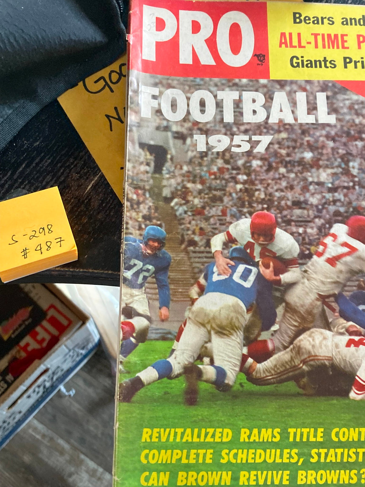 Close-up of the cover of the VTG Pro Football Magazine 1957, highlighting an intense football game scenario with players from the Chicago Bears and New York Giants.