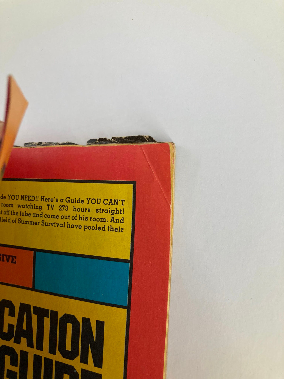 Close-up view of the corner of VTG Marvel Comics Pizzazz Issue 10 July 1978 showing wear and a torn edge. No Label.