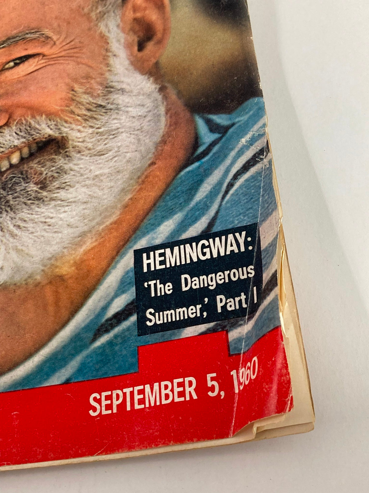 Close-up of the cover text from Life Magazine September 5, 1960, showcasing Ernest Hemingway's 'The Dangerous Summer', Part 1, with details of the magazine's publication date.