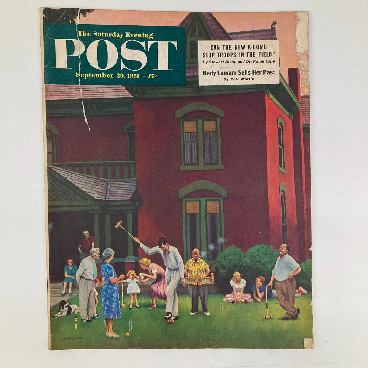 Cover of the Saturday Evening Post from September 29, 1951, featuring a vibrant illustration of a family gathering outdoors, playing croquet, and enjoying a sunny day.