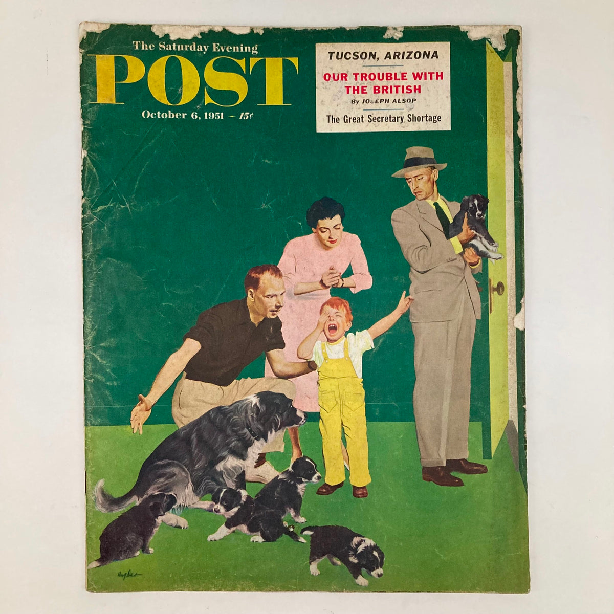 Saturday Evening Post Magazine Cover - October 6, 1951, featuring an illustrated scene with a family and playful puppies on a vibrant green background.