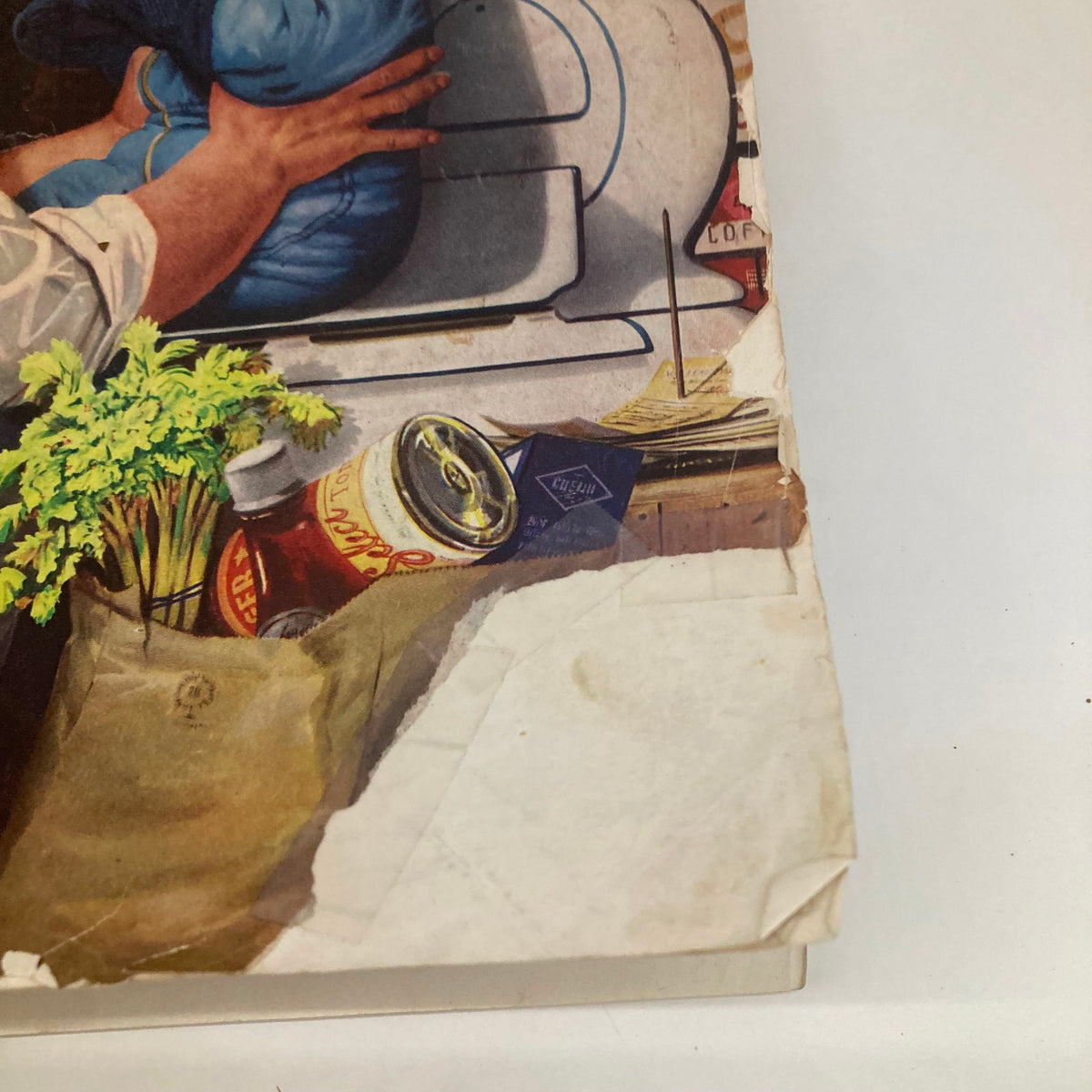 Detail from the Saturday Evening Post Magazine April 5 1952, featuring an illustrated cover by Dohanos with vintage items, showcasing the style of the early 1950s.