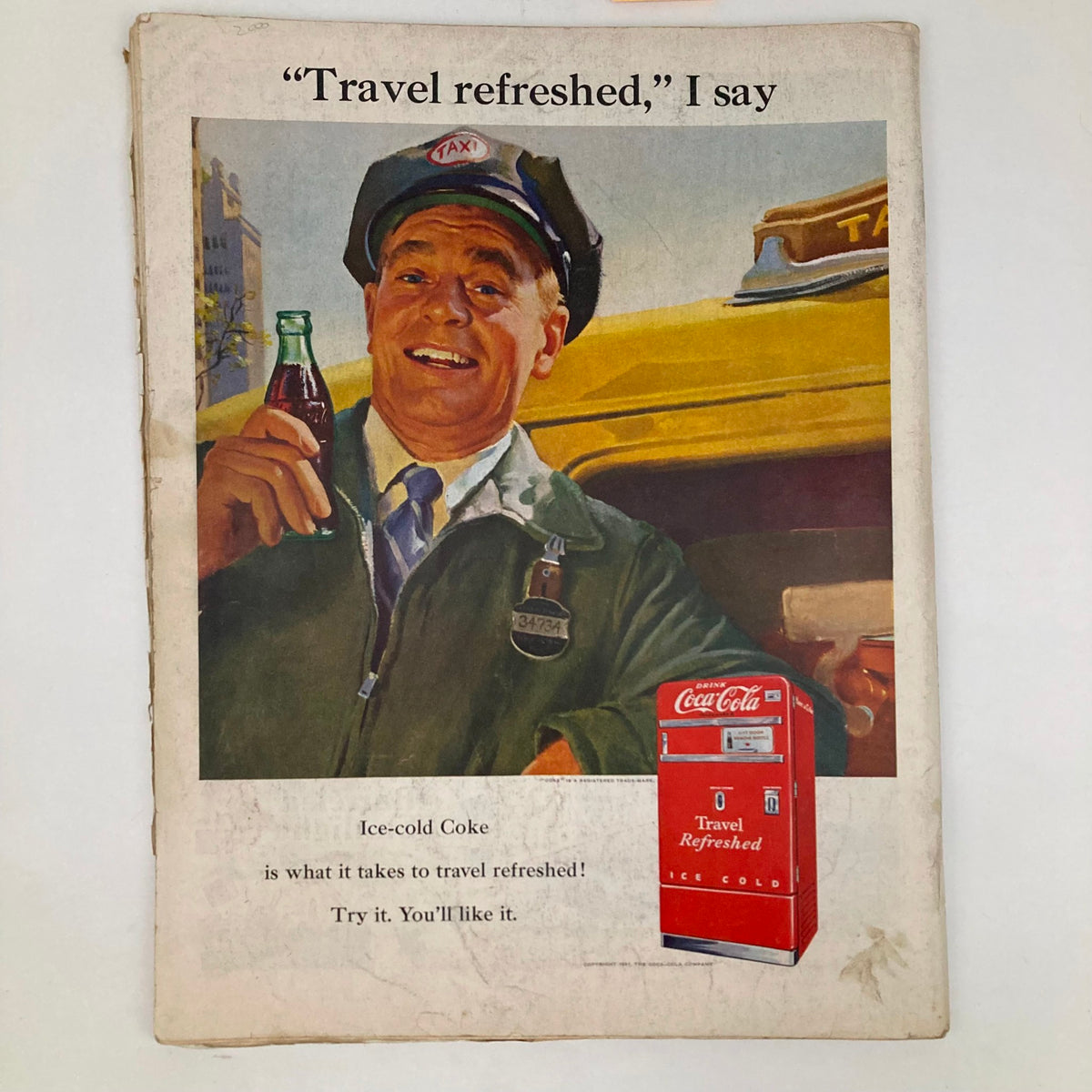 Advertisement for Coca-Cola from Saturday Evening Post Magazine May 19 1951 featuring a happy taxi driver holding a Coke, promoting vintage marketing.