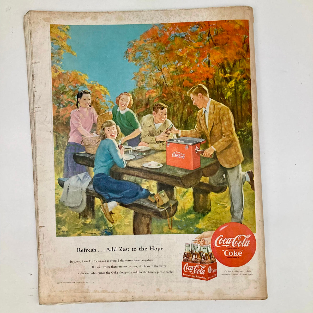 Saturday Evening Post October 7 1950 Illustrated Cover by John Clymer illustrating a cheerful picnic scene with friends enjoying Coca-Cola in a picturesque autumn setting.