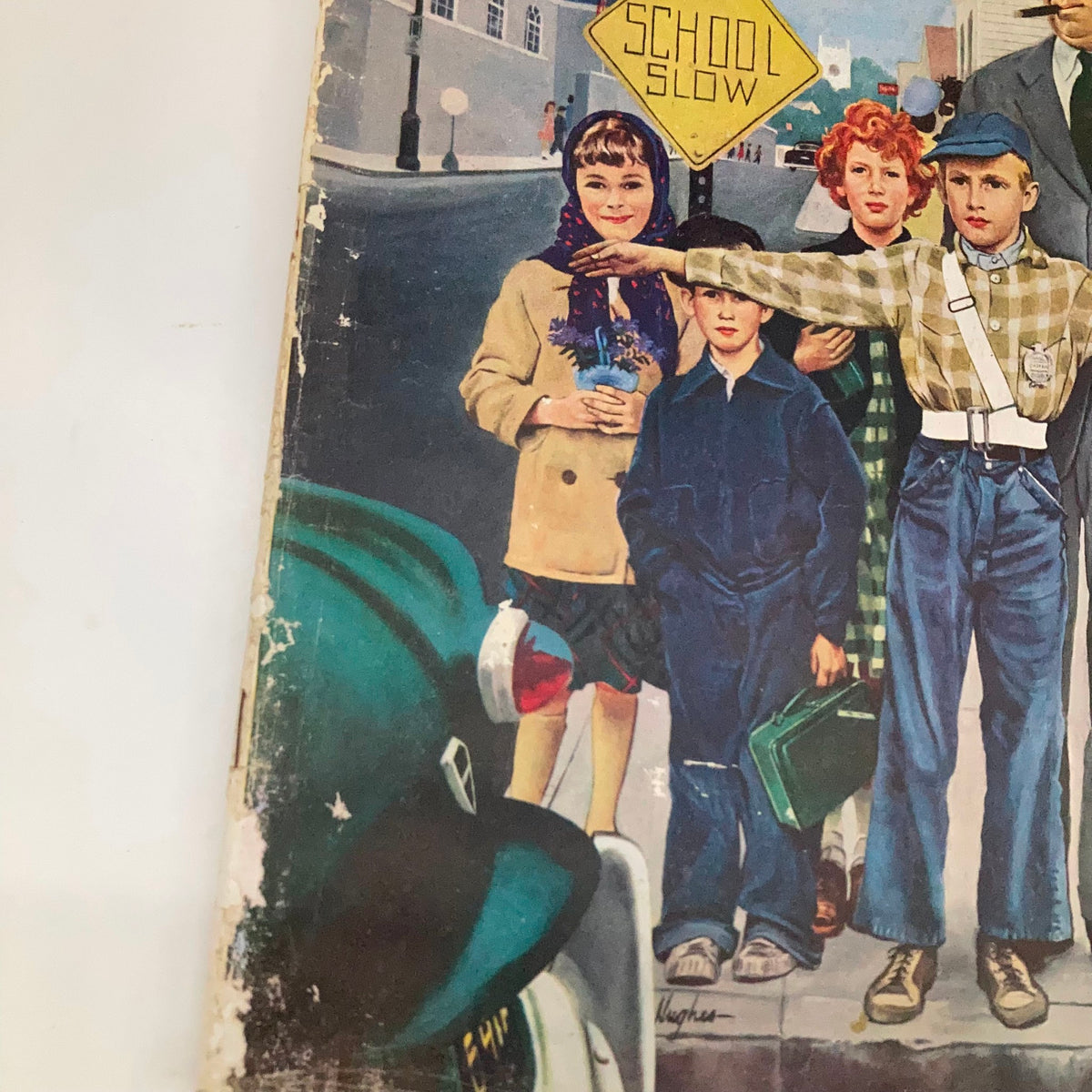 Close-up of the cover of the Saturday Evening Post Magazine, September 6, 1952, highlighting a traffic cop and children, with a school zone sign in view.