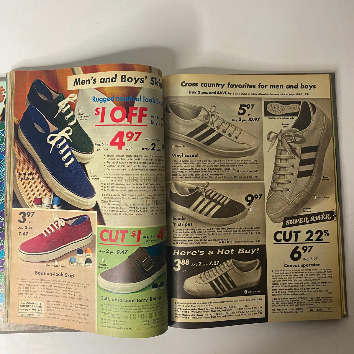 Inside pages of the 1971 Montgomery Ward Summer Catalog featuring a selection of men's and boys' casual shoes and sneakers, promoting affordable prices.