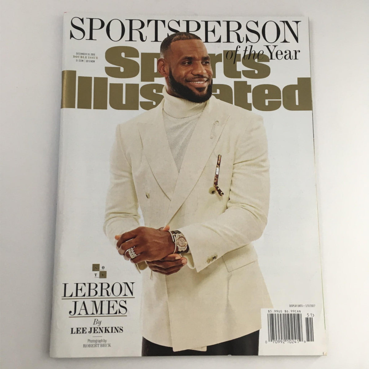 Sports Illustrated Magazine December 19, 2016 featuring LeBron James as Sports Person of the Year, showcasing his achievements in a stylish beige suit.