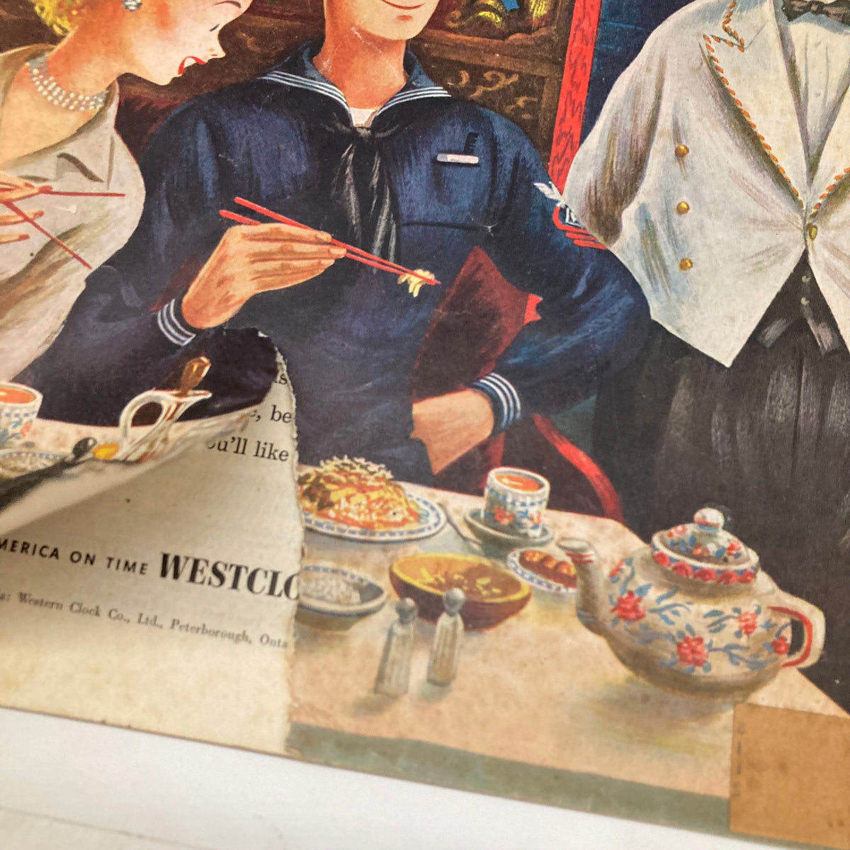 Close-up of the cover of Saturday Evening Post Magazine January 12, 1952, highlighting the sailor holding chopsticks, with a table spread of dishes, capturing the vintage art style of Constantin Alajalov.