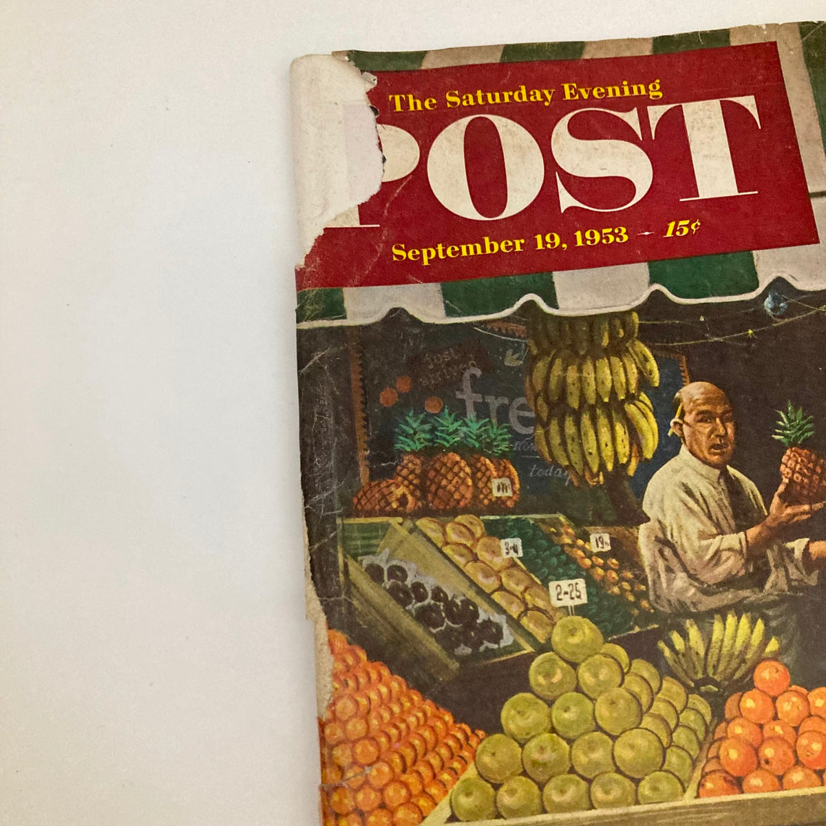 Close-up view of the cover of the Saturday Evening Post Magazine dated September 19, 1953, highlighting the colorful fruit display including pineapples and oranges.