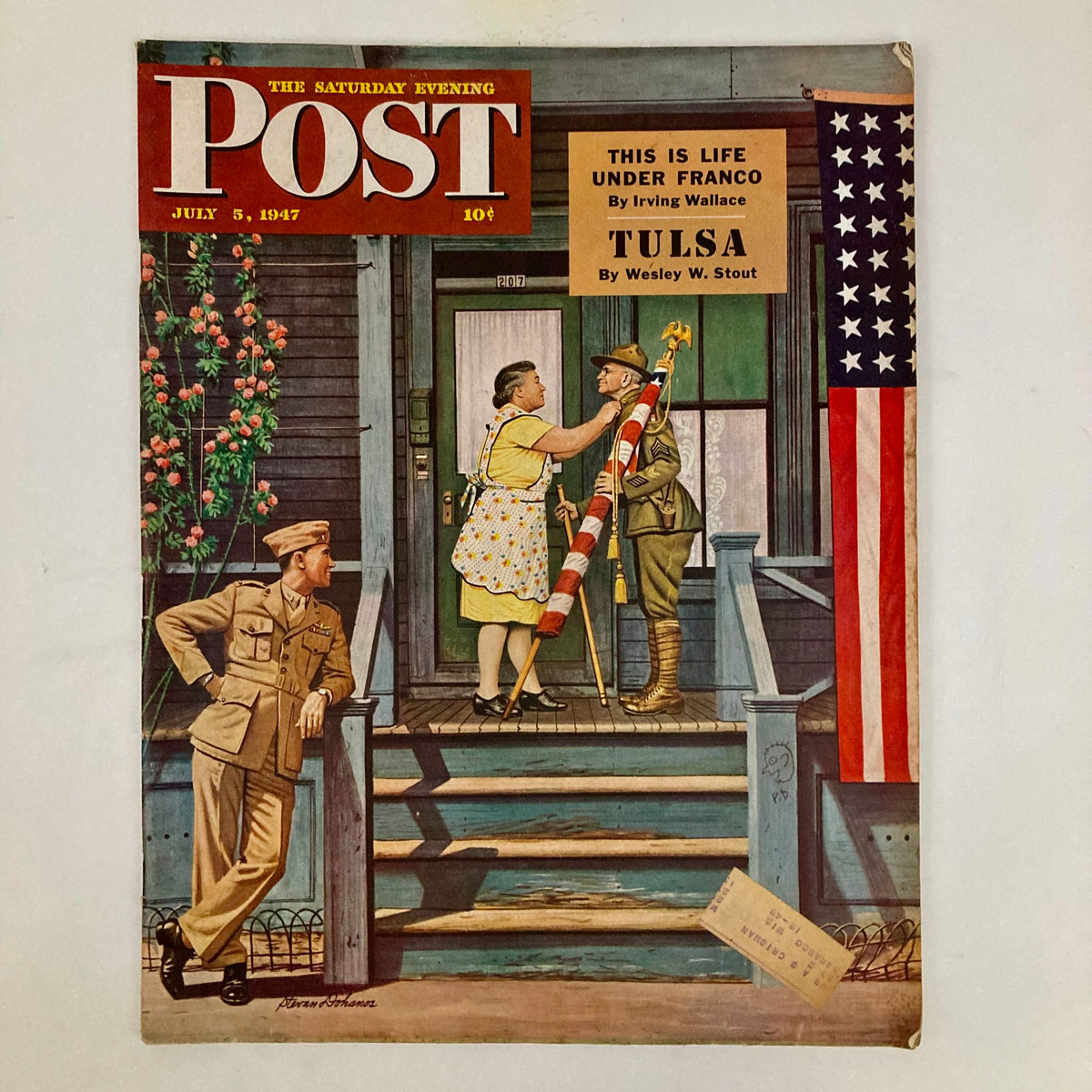 Cover of Saturday Evening Post Magazine July 5, 1947 featuring a colorful illustration by Stevan Dohanos depicting a woman greeting a soldier and an American flag, capturing post-war American life.