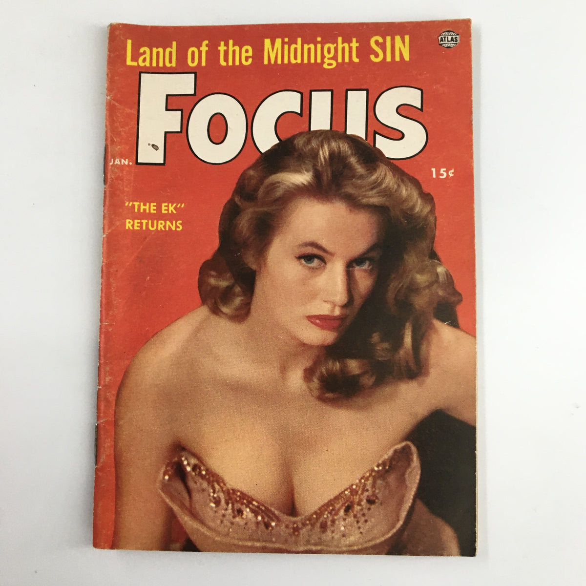VTG Focus Magazine January 1956 cover featuring an alluring portrait, showcasing the article 'Land of the Midnight Sin' and the return of 'The EK'.