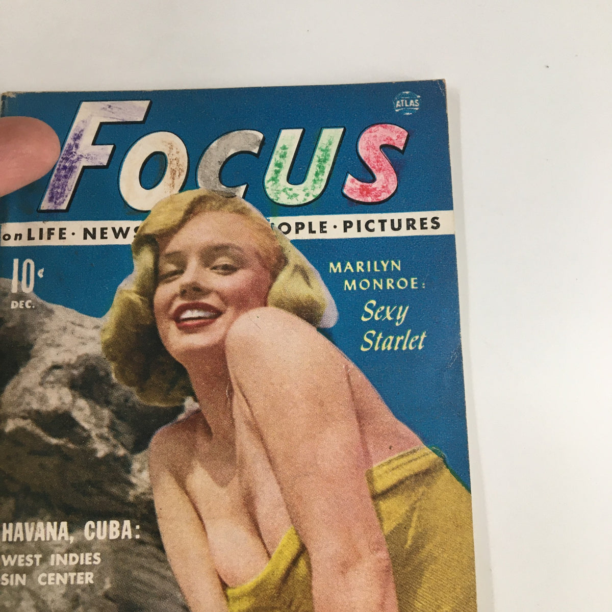 Cover of VTG Focus Magazine December 1951 featuring Marilyn Monroe as a Sexy Starlet, showcasing colorful graphics and vintage aesthetics.