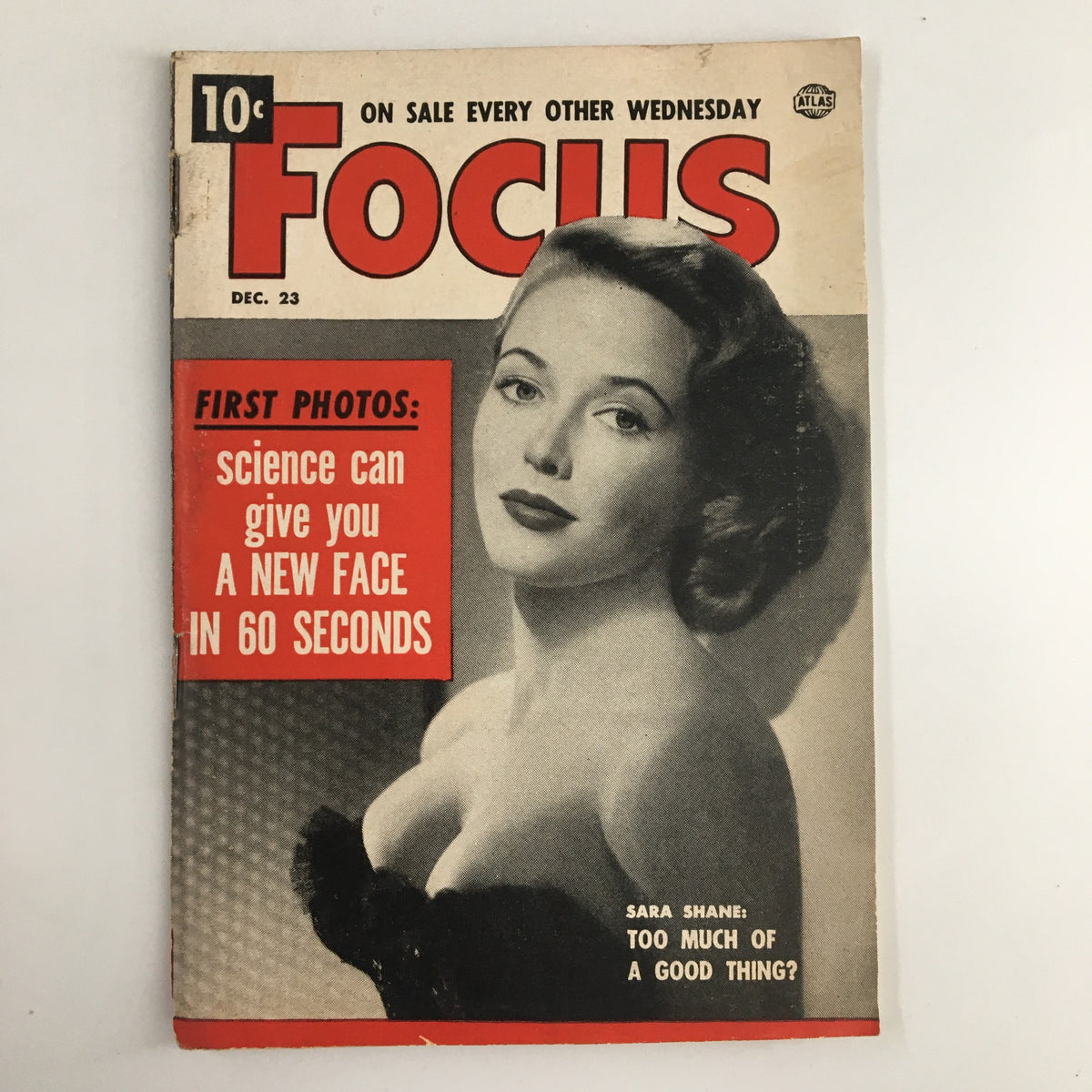 Cover of VTG Focus Magazine December 23, 1953, featuring Sara Shane and the article 'Too Much of a Good Thing'. The magazine showcases vintage style and graphics from the 1950s.