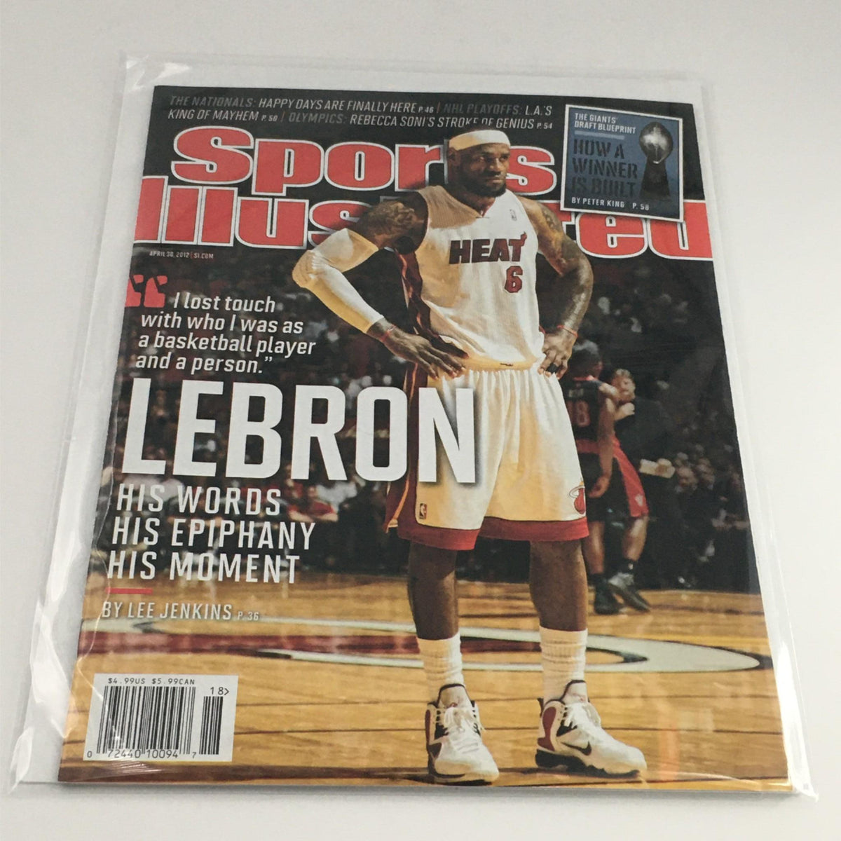 Protective cover of Sports Illustrated Magazine April 30, 2012 featuring LeBron James, emphasizing its near mint condition for collectors.