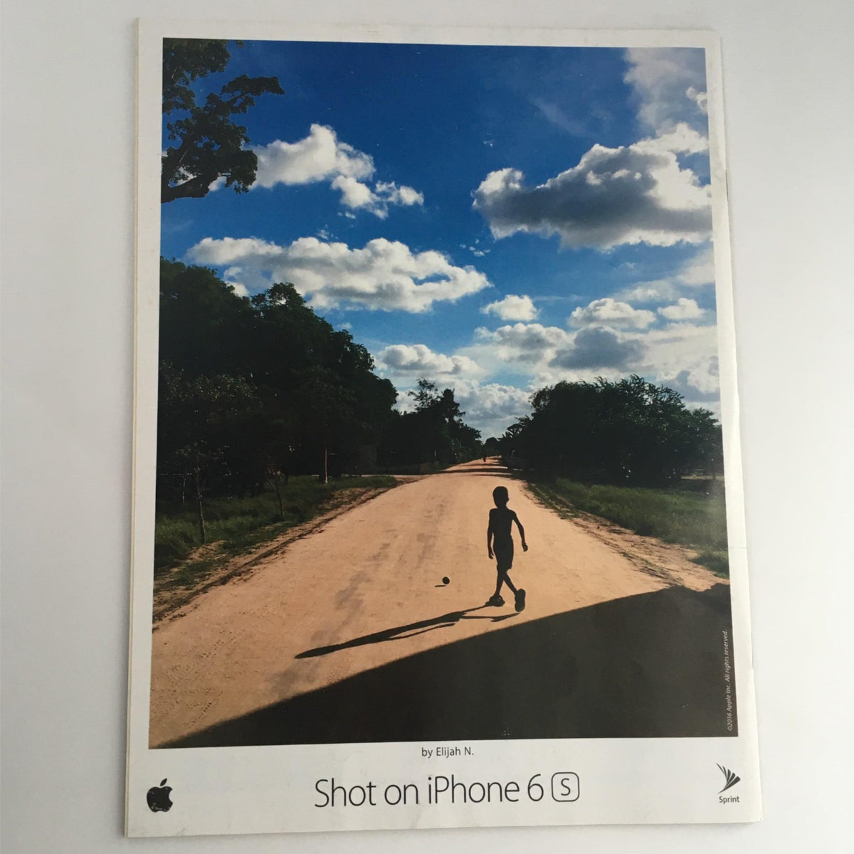 Cover of Sports Illustrated featuring a serene landscape photograph taken with an iPhone 6s, highlighting the tagline 'Shot on iPhone 6s.' This is part of the promotional campaign showcasing photography capabilities.