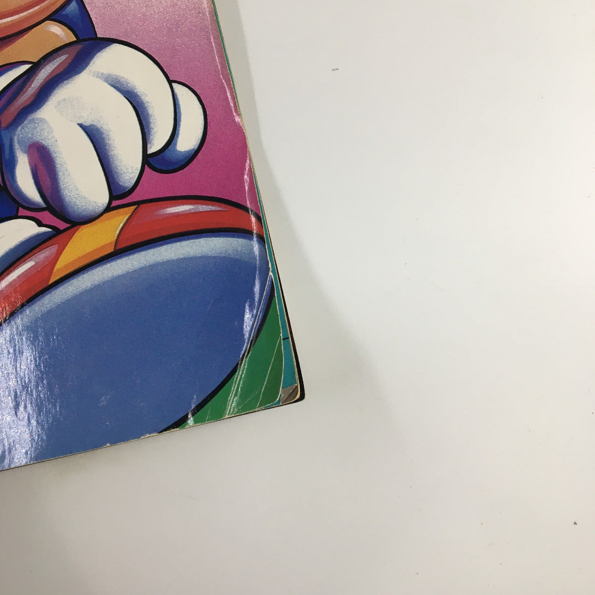 Close-up of the front cover corner of GamePro Magazine June 1991, highlighting the colorful art of Sonic The Hedgehog with some visible wear, indicative of its vintage status.