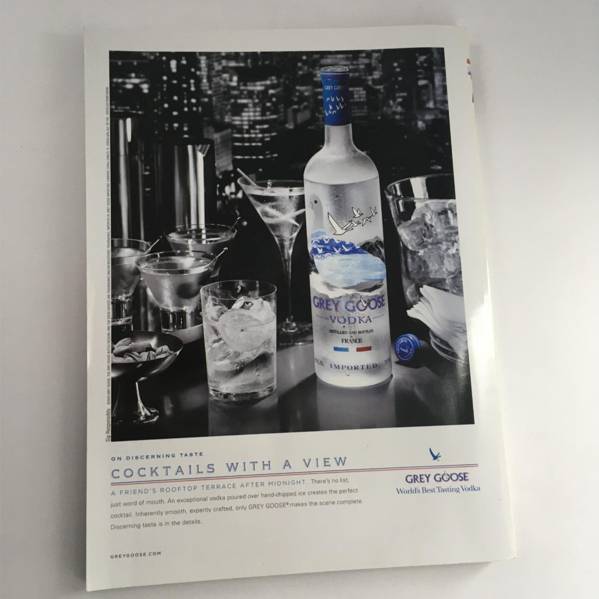 Back cover of GQ Magazine September 2010 showcasing a Grey Goose Vodka advertisement. The image features cocktails and a bottle of Grey Goose with the tagline 'Cocktails with a View'.