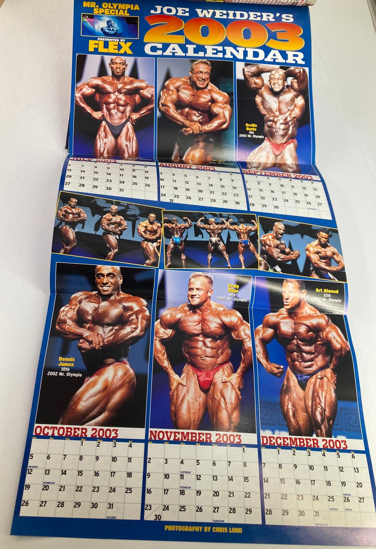 Joe Weider's 2003 Calendar included in Flex Magazine February 2003 Vol 20 #12, featuring bodybuilding icons and highlighting the Mr. Olympia Special.