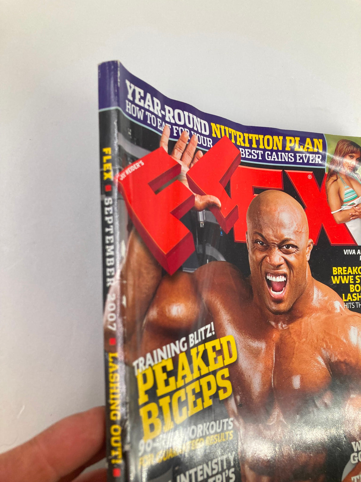Side view of Flex Magazine September 2007 with the title visible and WWE Superstar Bobby Lashley on the cover, highlighting the magazine's vintage appeal.