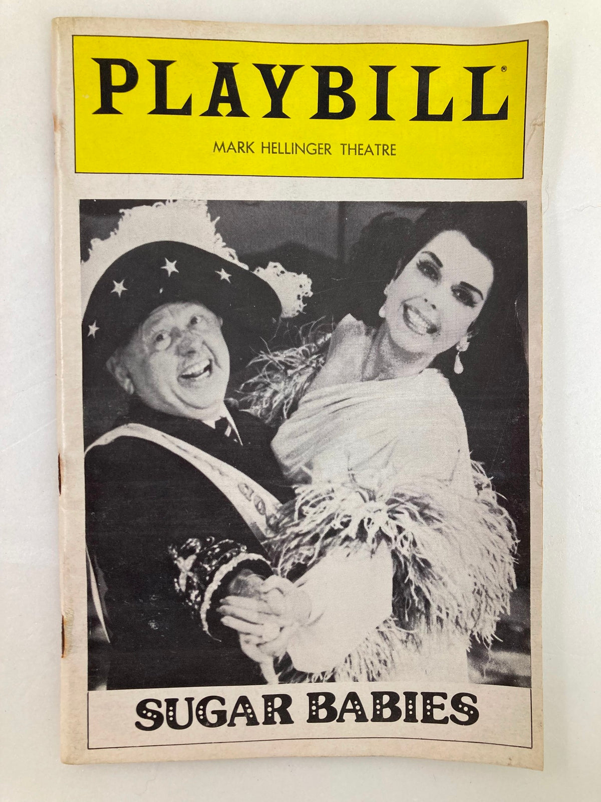 1982 Playbill from the Mark Hellinger Theatre featuring Mickey Rooney in the musical 'Sugar Babies', showcasing a vibrant cover with a black and white image of the cast.