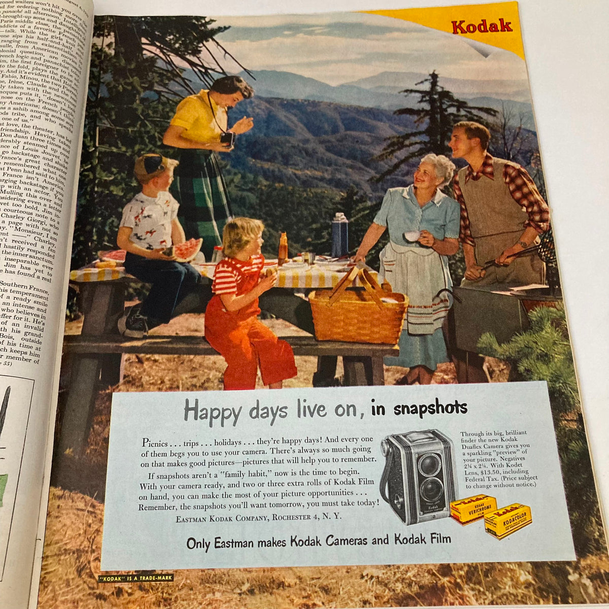 Kodak advertisement from Saturday Evening Post Magazine August 6 1949, showcasing a picturesque picnic scene with families enjoying their time outdoors, promoting Kodak cameras and snapshots.