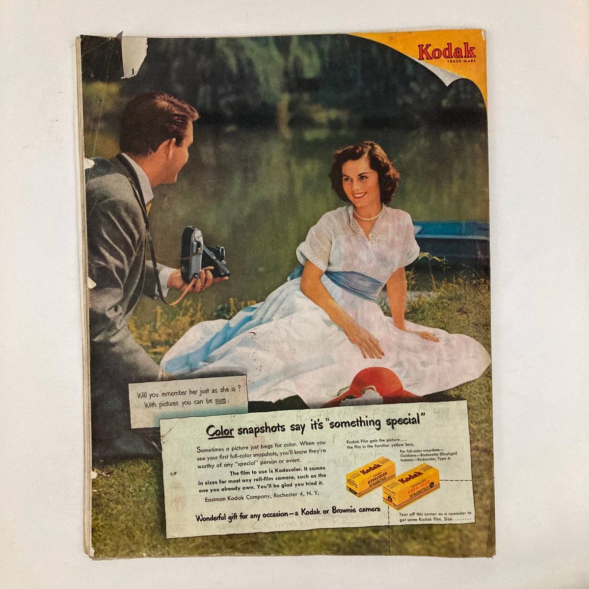 Back cover of Saturday Evening Post Magazine April 15, 1950, featuring a Kodak advertisement with a couple and a camera, highlighting the importance of capturing memories.