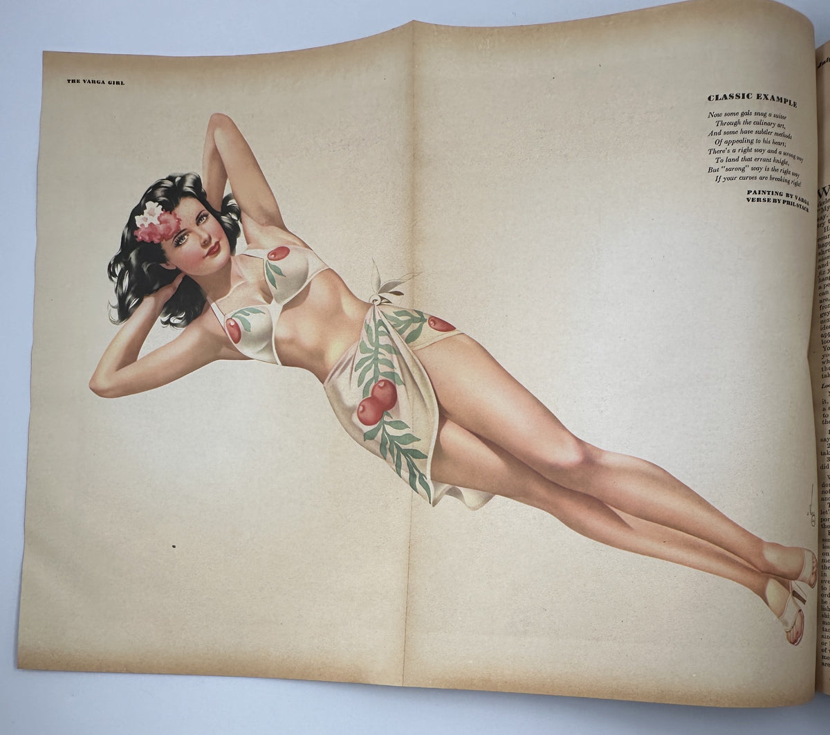 Esquire Magazine July 1945 Varga Foldout featuring a classic Varga girl in a decorative swimwear design, embodying vintage pinup art.