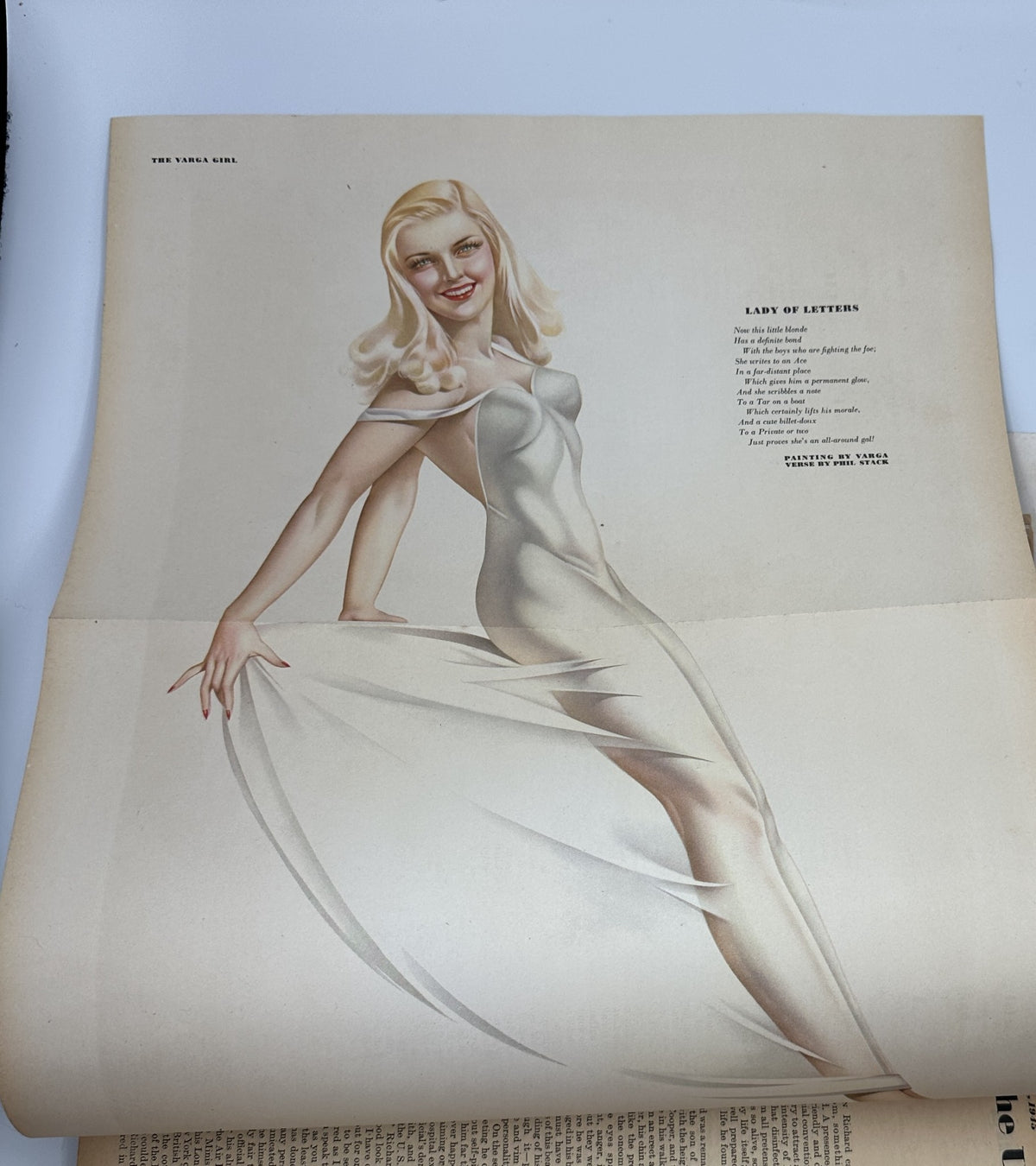 Varga foldout art from March 1945 Esquire Magazine featuring a pinup titled 'Lady of Letters', highlighting classic pinup aesthetics.