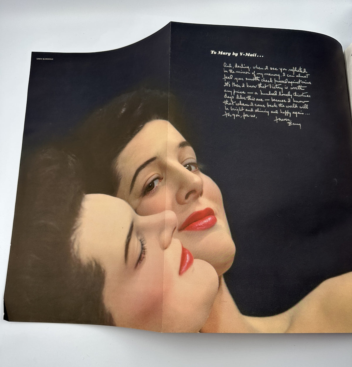 Inside fold of Esquire Magazine January 1943 featuring a stunning pin-up photograph with a handwritten note, exemplifying the editorial style of the era.